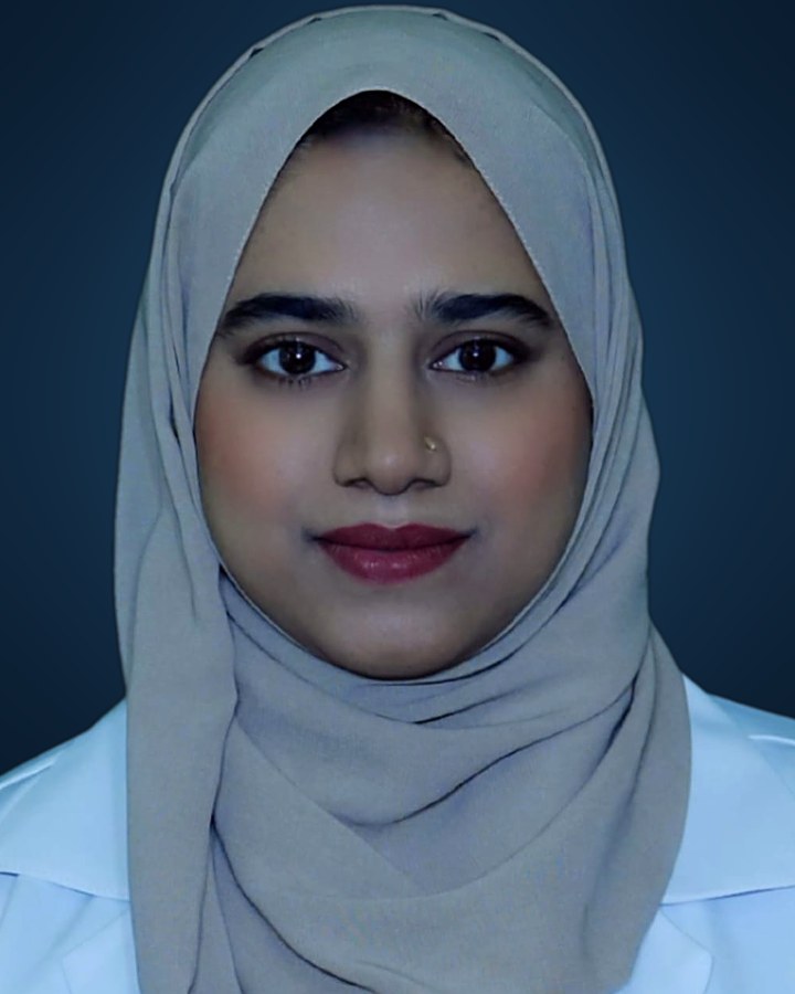 Portrait of Dr. Humera Fatima in her white coat